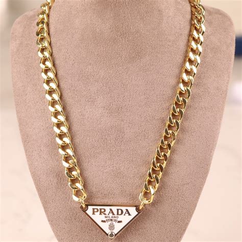 prada necklace dupe|Prada triangle necklace gold.